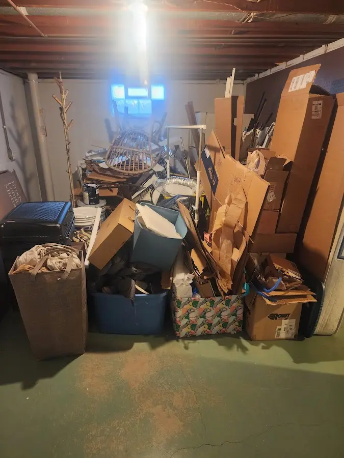 Roll-off dumpster container at job site for 2 Yard Dumpster Rental in Treasure Island